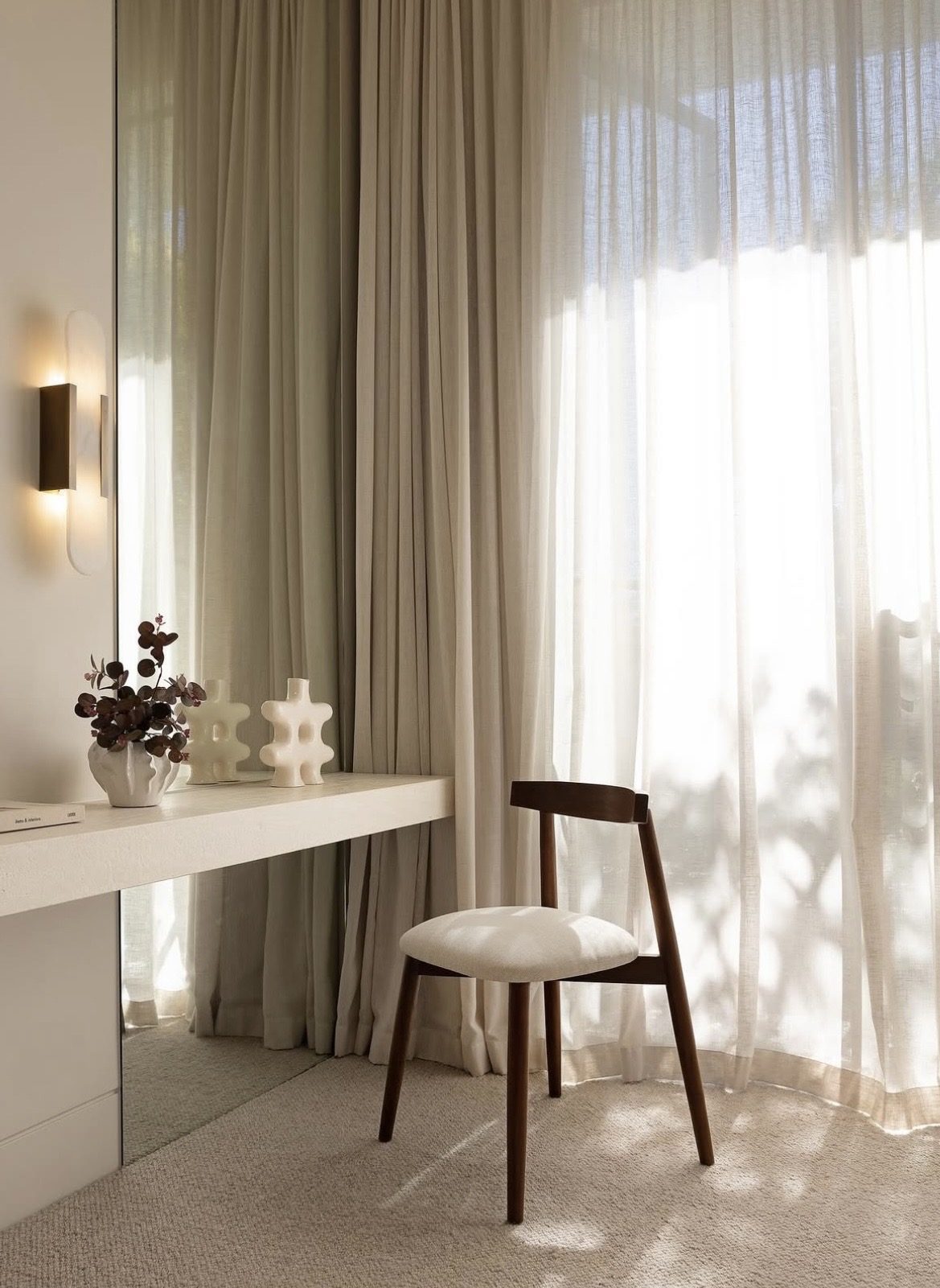 Sheer curtains in a light-filled living room